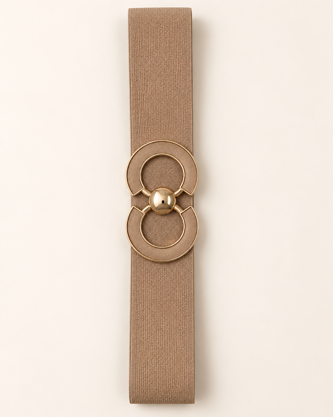 Ceinture ORIANE beige, bande élastique et boucle double cercle à contours dorés, vue à plat sur fond beige.