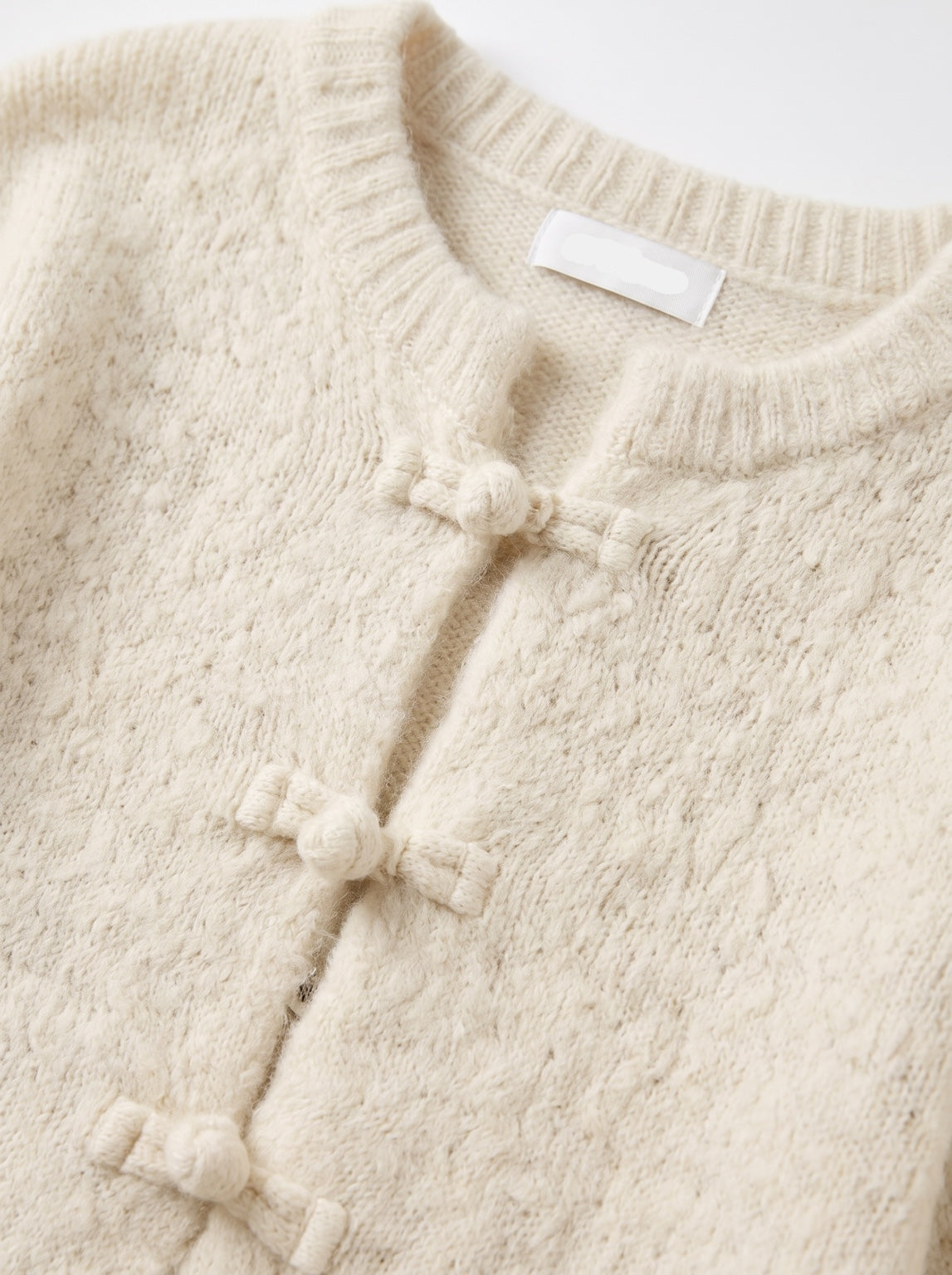 Gilet ÉCLAT écru – détail de la maille