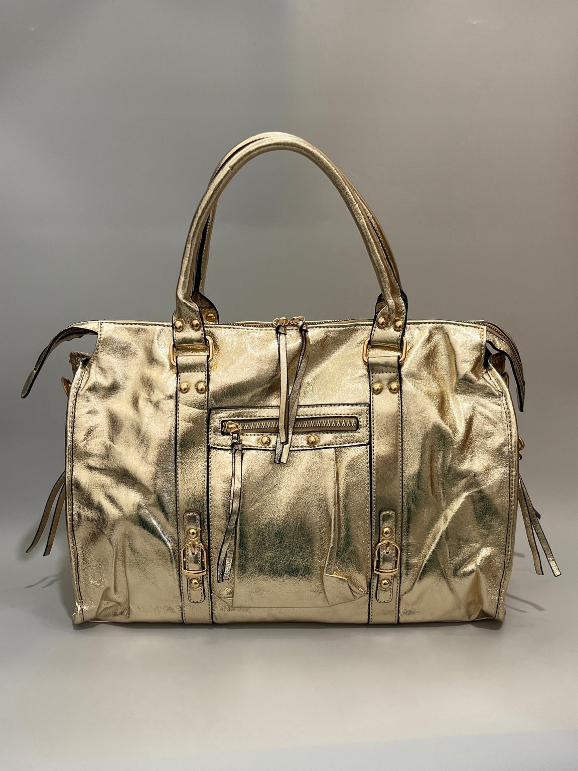 Sac grand format doré brillant avec détails métalliques